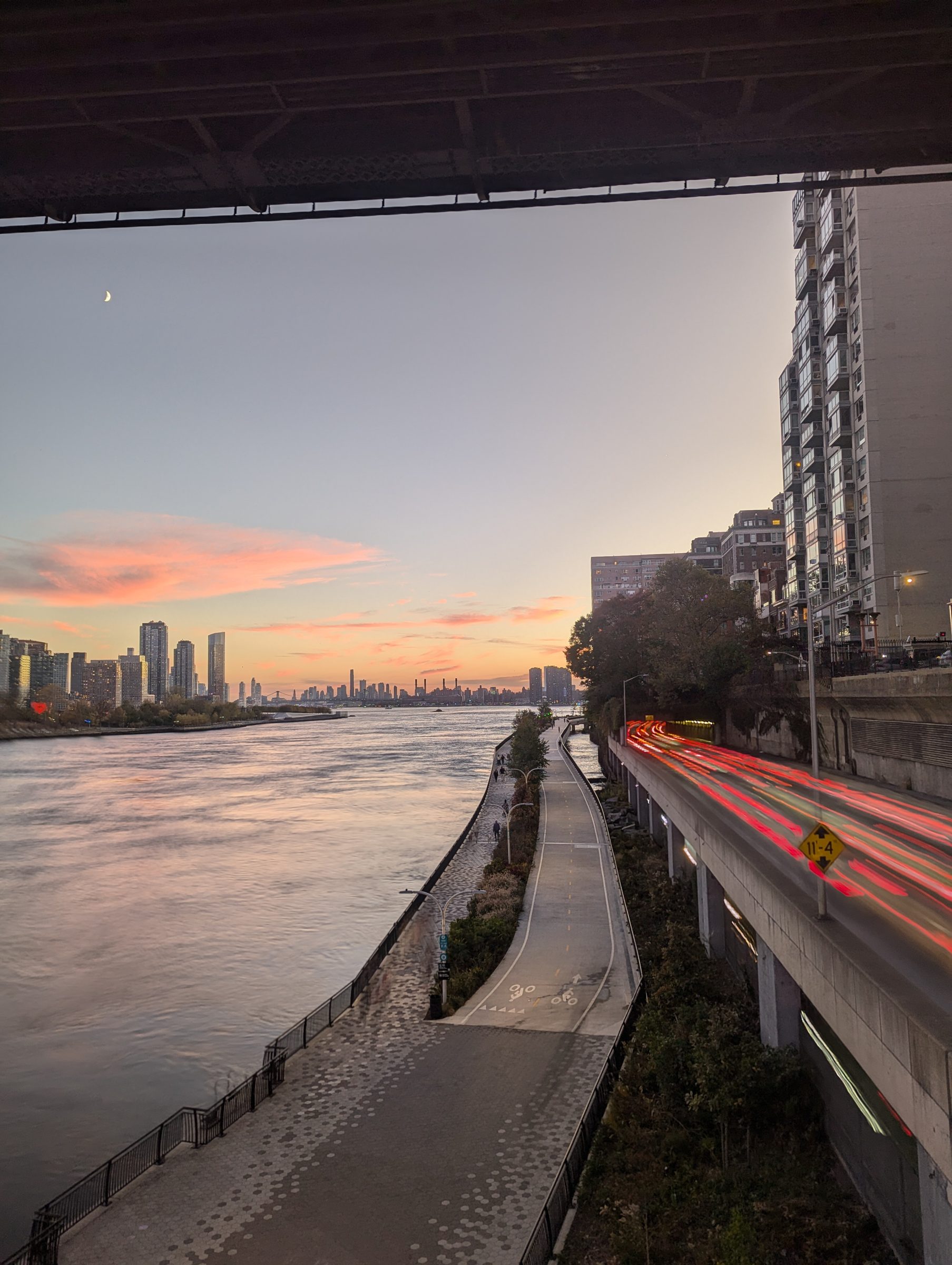 The East River greenway running path at sunset