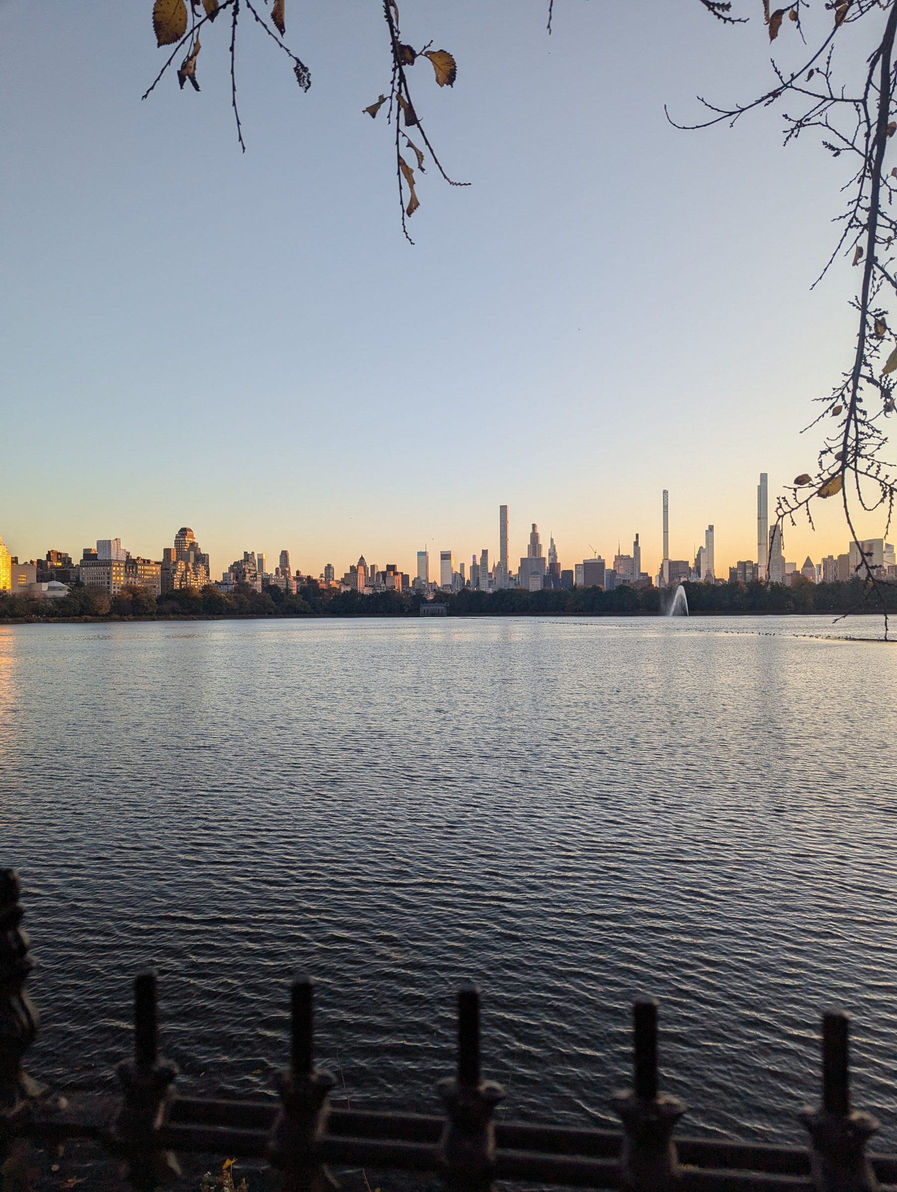 The Central Park reservoir and Manhattan skyline at golden hour